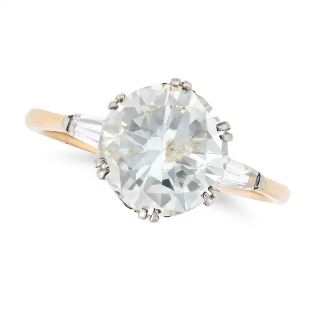 A FINE DIAMOND THREE STONE RING set with a transitional cut diamond of approximately 3.06 carats,