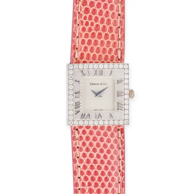 TIFFANY & CO., A LADIES DIAMOND ATLAS WRISTWATCH, in 18 carat white gold, the square polished case
