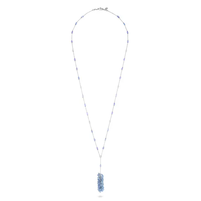 A SAPPHIRE, TANZANITE AND DIAMOND NECKLACE comprising a trace chain set with oval cut tanzanites and