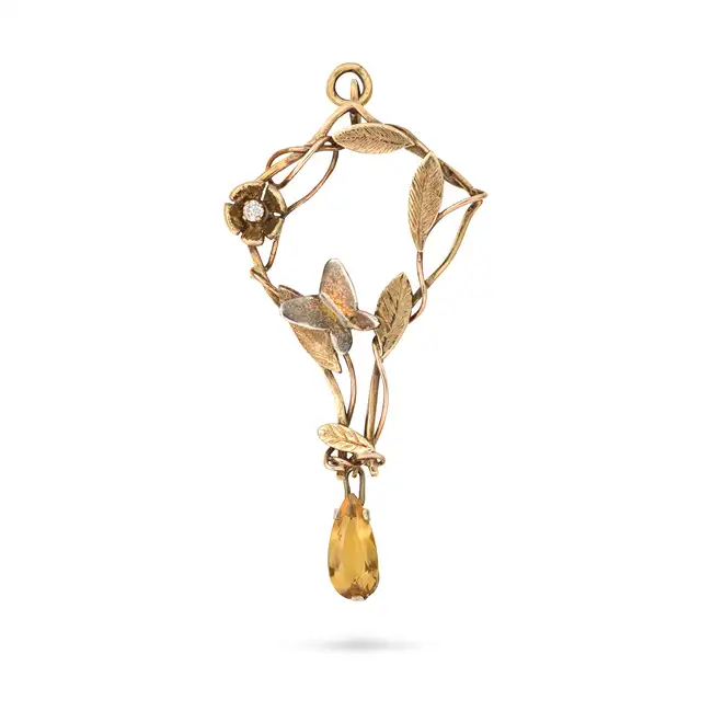 NO RESERVE - AN ART NOUVEAU CITRINE AND DIAMOND PENDANT in yellow gold, the foliate style pendant
