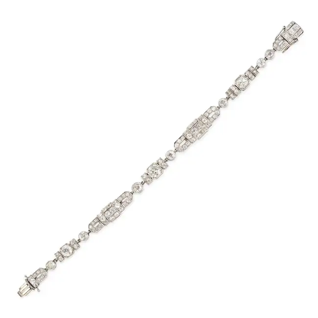 A FINE ART DECO DIAMOND BRACELET comprising a series of geometric links set throughout with old