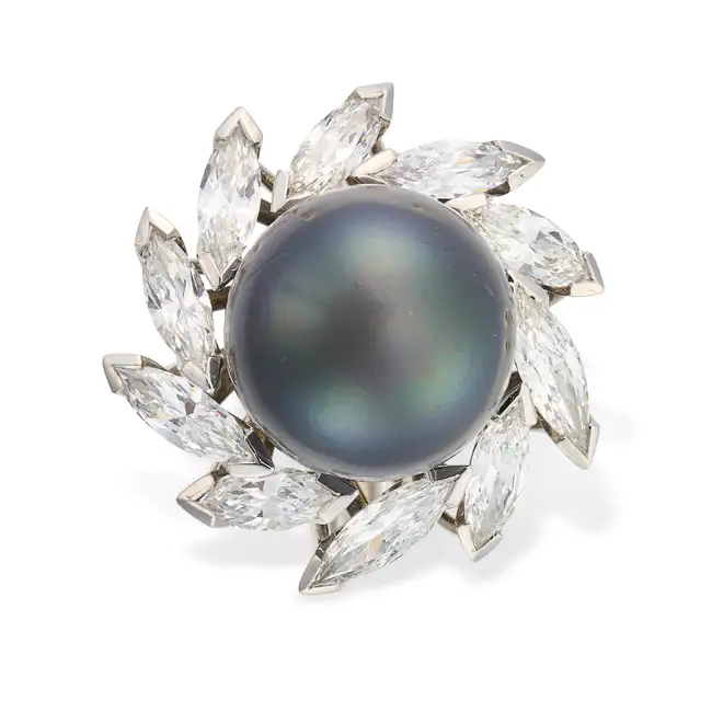 GRIMA, A VINTAGE NATURAL SALTWATER PEARL AND DIAMOND DRESS RING in platinum, set with a black