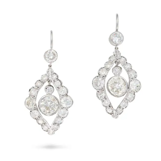 A PAIR OF DIAMOND DROP EARRINGS each of openwork design, set with old European cut diamond drops