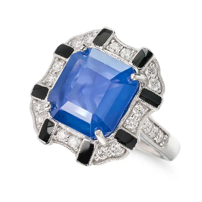 A CEYLON SAPPHIRE, DIAMOND AND ENAMEL RING set with an octagonal step cut sapphire of 6.86 carats,