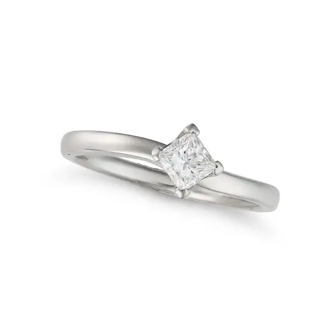 A SOLITAIRE DIAMOND RING in platinum, set with a princess cut diamond of 0.41 carats, full British