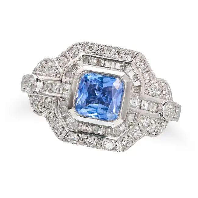 OSCAR FRIEDMAN, AN UNHEATED SAPPHIRE AND DIAMOND RING set with an octagonal mixed cut sapphire of
