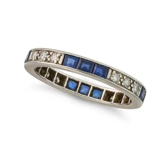 AN ART DECO SAPPHIRE AND DIAMOND FULL ETERNITY RING set all around with trios of rectangular step