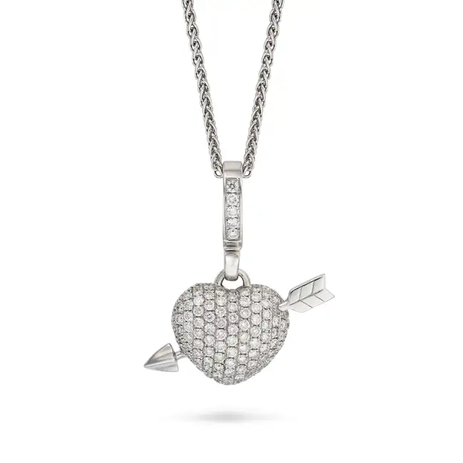 THEO FENNELL, A DIAMOND HEART AND ARROW PENDANT NECKLACE in 18ct white gold, the pendant designed as