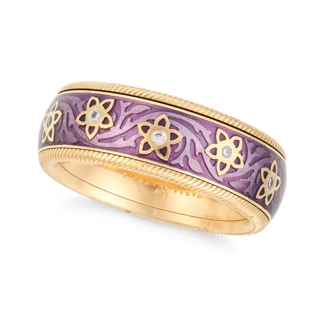WELLENDORF, A PURPLE ENAMEL AND DIAMOND SPINNER RING the rotating band decorated with purple