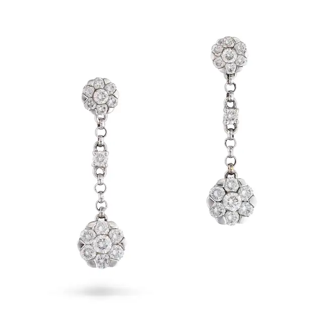 A PAIR OF DIAMOND CLUSTER DROP EARRINGS in 18ct white gold, each comprising a cluster of round