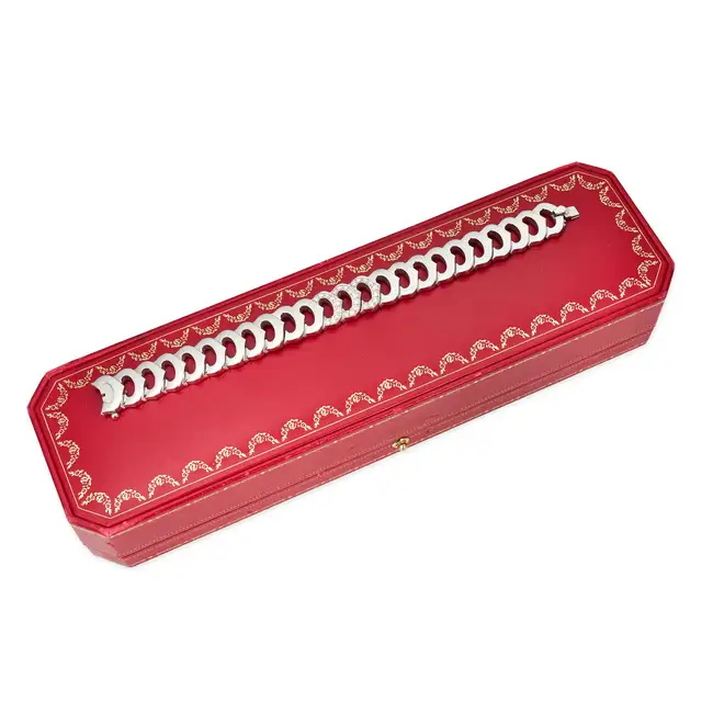 CARTIER, A DIAMOND C DE CARTIER BRACELET in 18ct white gold, comprising a row of C shaped links,