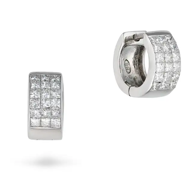 A PAIR OF DIAMOND HOOP EARRINGS in 18ct white gold, each huggie hoop channel set with princess cut