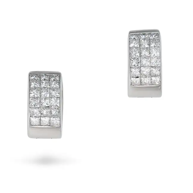 A PAIR OF DIAMOND HOOP EARRINGS in 18ct white gold, each huggie hoop channel set with princess cut