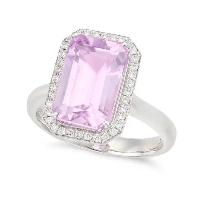 NO RESERVE - A KUNZITE AND DIAMOND DRESS RING set with an octagonal step cut kunzite of 6.10