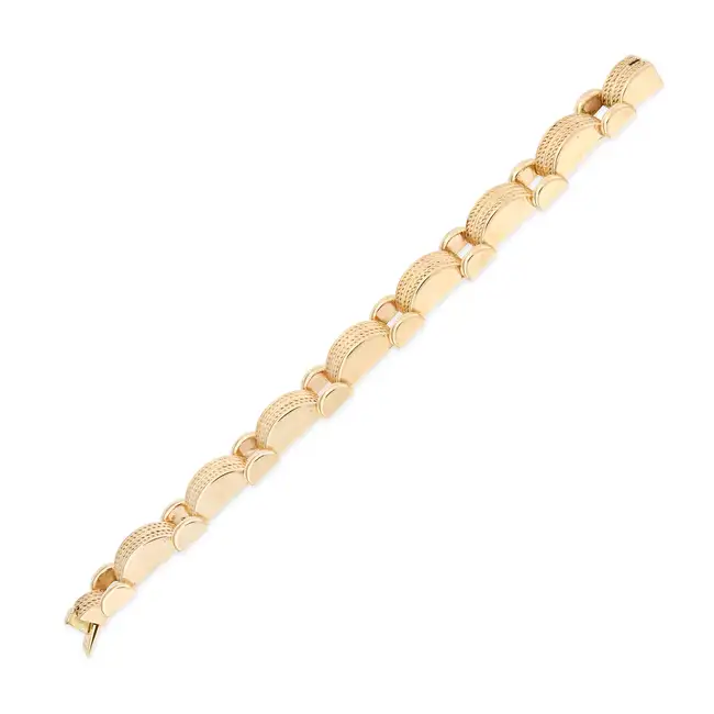 TIFFANY & CO, A RETRO GOLD TANK BRACELET in 14ct yellow gold, comprising a series of bevelled