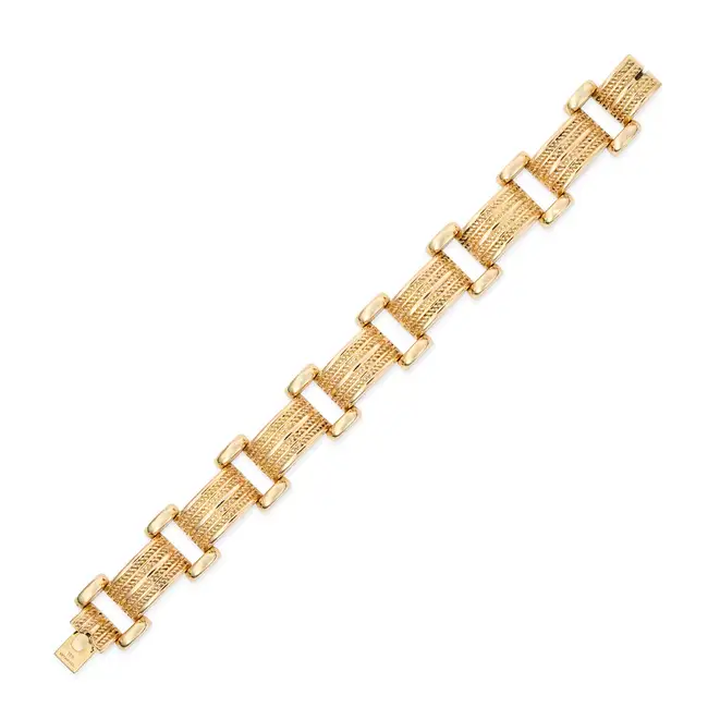 TIFFANY & CO, A RETRO GOLD TANK BRACELET in 14ct yellow gold, comprising a series of bevelled