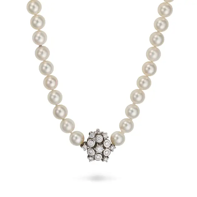 MIKIMOTO, AN AKOYA PEARL AND DIAMOND NECKLACE comprising a single row of pearls, the clasp set