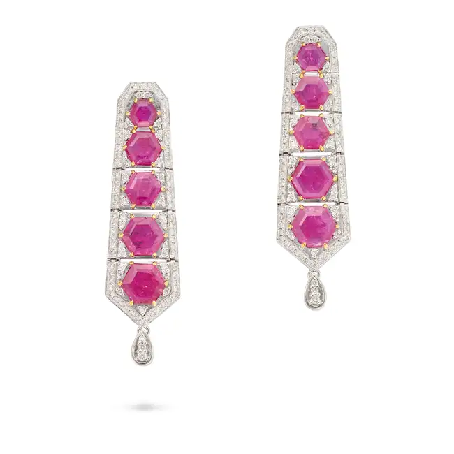A PAIR OF UNHEATED RUBY AND DIAMOND DROP EARRINGS in platinum, each comprising a graduating row of