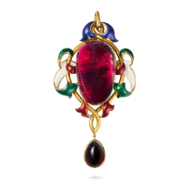 A FINE ANTIQUE VICTORIAN GARNET AND ENAMEL PENDANT in yellow gold, set with a large cabochon garnet,