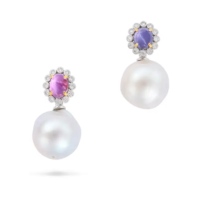 A PAIR OF MISMATCHED STAR SAPPHIRE, PEARL AND DIAMOND DROP EARRINGS each comprising a star pink