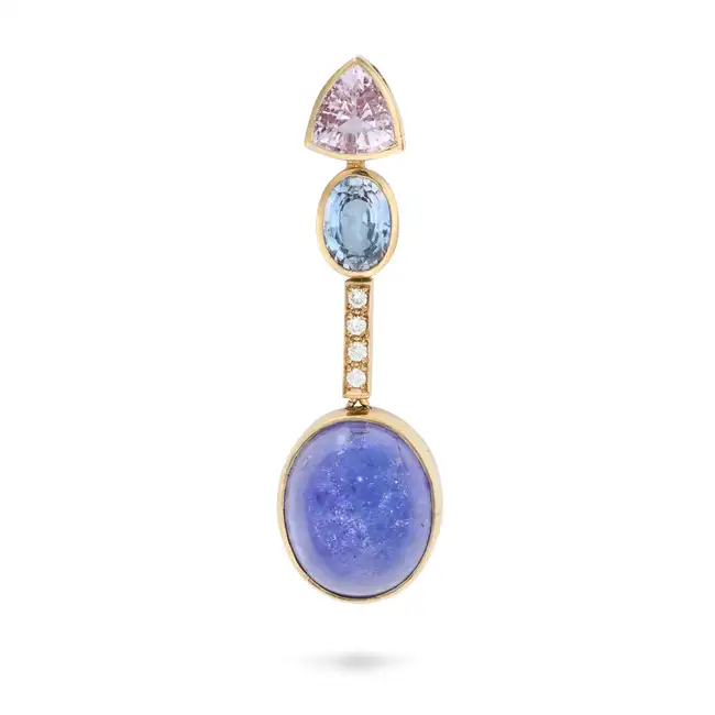 A TANZANITE, BLUE TOPAZ, MORGANITE AND DIAMOND PENDANT set with an oval cabochon tanzanite of