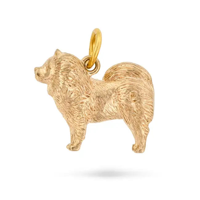 NO RESERVE - A GOLD DOG CHARM / PENDANT in 9ct yellow gold, designed as a Chow Chow, full British