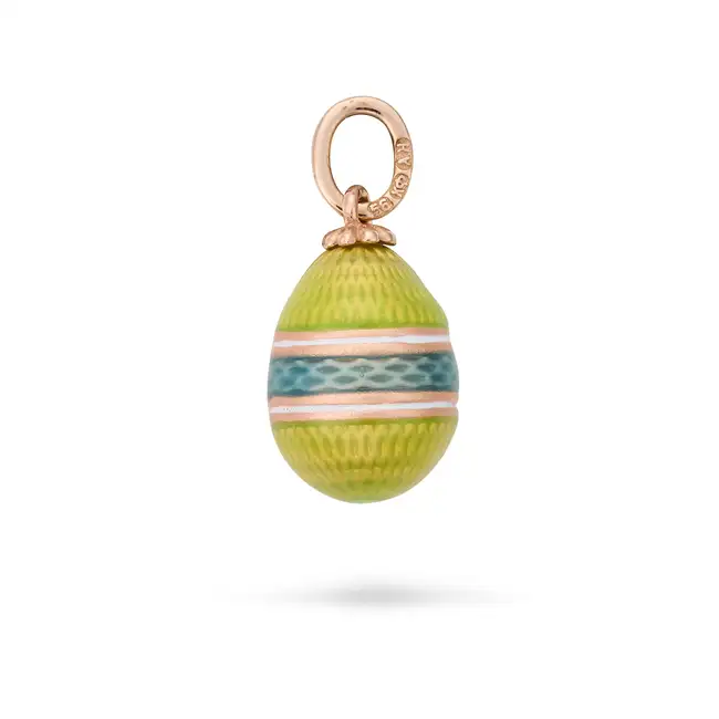 A RUSSIAN ENAMEL EGG PENDANT the egg shaped pendant relieved in green and teal enamel, accented by
