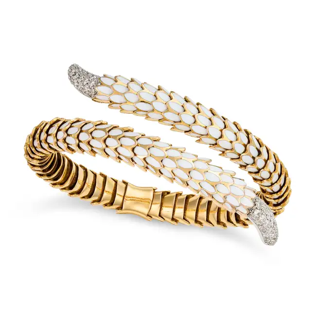 ATTR. ROBERTO COIN, A DIAMOND AND ENAMEL COBRA BANGLE designed as a stylised coiled snake, the