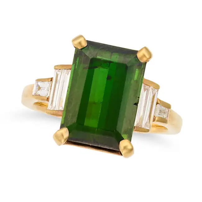 A GREEN TOURMALINE AND DIAMOND DRESS RING in 18ct yellow gold, set with an octagonal step cut
