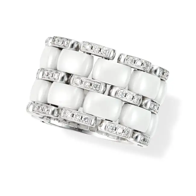 CHANEL, A WHITE CERAMIC AND DIAMOND ULTRA RING in 18ct white gold, the flexible band set with two