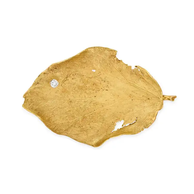 ANDREW GRIMA, A DIAMOND LEAF BROOCH, 1968 in 18ct yellow gold, realistically modelled as a leaf