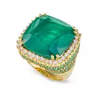 MORAGLIONE, A SOUDE EMERALD, EMERALD AND ROUND BRILLIANT CUT DIAMONDS in 18ct yellow gold, set