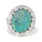 SALAVETTI, AN IMPORTANT UNTREATED 7.93 CARAT BLACK OPAL AND DIAMOND CLUSTER RING in 18ct white gold,