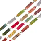 NO RESERVE - A VINTAGE SAUTOIR NECKLACE comprising a single row of varicoloured resin batons, no