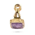 AN ANTIQUE AMETHYST FOB SEAL / PENDANT the scrolling foliate style pendant set with an amethyst