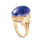 A VINTAGE SAPPHIRE DRESS RING in 18ct yellow gold, set with an oval cabochon sapphire of 21.42