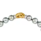 A FINE TAHITIAN PEARL, DIAMOND AND YELLOW SAPPHIRE NECKLACE comprising a single row of thirty one