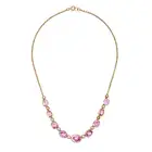 AN ANTIQUE PINK TOPAZ AND PEARL NECKLACE  comprising a row of alternating oval cut pink topaz and