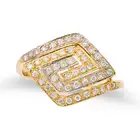 NO RESERVE - A DIAMOND DRESS RING in 18ct white and yellow gold, the stylised ring set with round