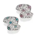 A FINE ALEXANDRITE AND DIAMOND DRESS RING the crossover ring in openwork foliate design, set with