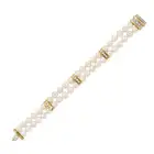 NO RESERVE - A PEARL AND DIAMOND BRACELET in 18ct yellow gold and white gold, comprising two rows of