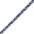 A SAPPHIRE AND DIAMOND BRACELET set throughout with round cut sapphires, accented by round brilliant
