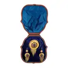 NO RESERVE - AN ANTIQUE VICTORIAN GARNET ETRUSCAN REVIVAL BROOCH AND EARRINGS SUITE, CIRCA 1860 in