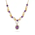 A VINTAGE AMETHYST AND PEARL NECKLACE in 9ct yellow gold, the necklace in foliate design, set with
