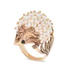 A PEARL HEDGEHOG EARRINGS AND RING SUITE the ring designed as a hedgehog set with pearls, the nose