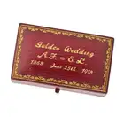 A PAIR OF ANTIQUE PEARL AND ENAMEL PILL POTS comprising two pill pots decorated with blue enamel,