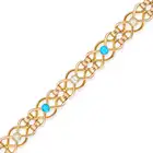 AN ANTIQUE TURQUOISE AND PEARL BRACELET in 15ct yellow gold, comprising a row of fancy links set