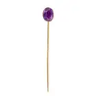 AN ANTIQUE AMETHYST STICK PIN set with an oval cut amethyst, no assay marks, 1.1cm, 2.1g.