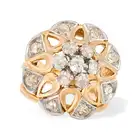 A VINTAGE FRENCH DIAMOND DRESS RING in 18ct yellow gold and platinum, designed as a stylised flower,