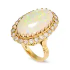 NO RESERVE - A VINTAGE OPAL AND DIAMOND COCKTAIL RING in 18ct yellow gold, set with a large oval
